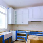 New,Kitchen,Construction,Underway,Featuring,White,Cabinets,House,Sink,Along